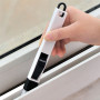 Set of versatile brushes for cleaning door and window grooves.